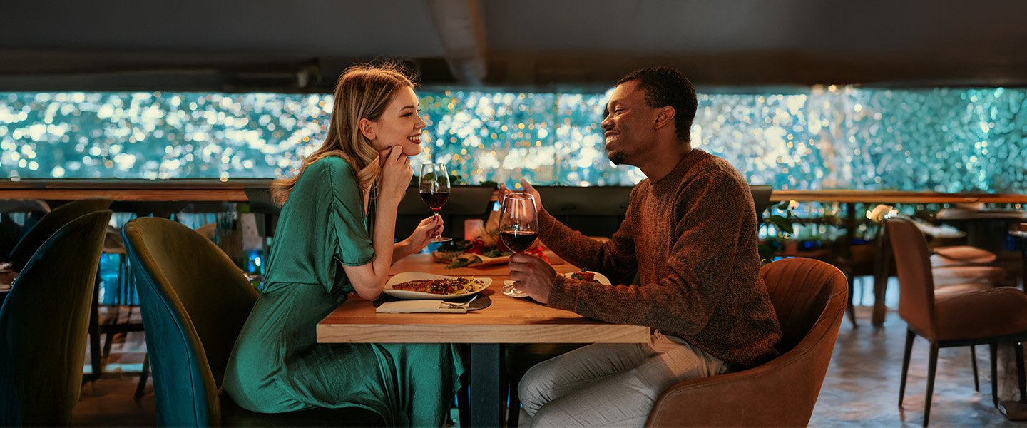 WhatsYourPrice Couple eating at a restaurant