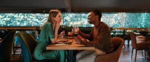 WhatsYourPrice Couple eating at a restaurant
