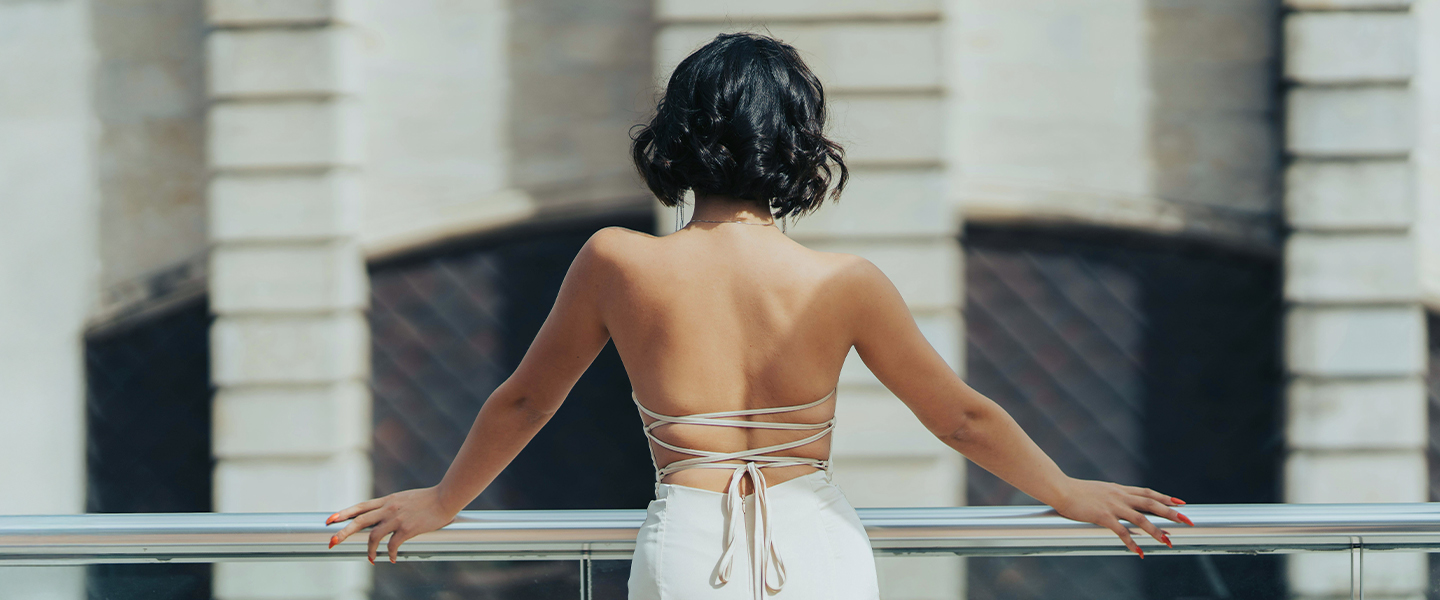 Woman overlooking balcony